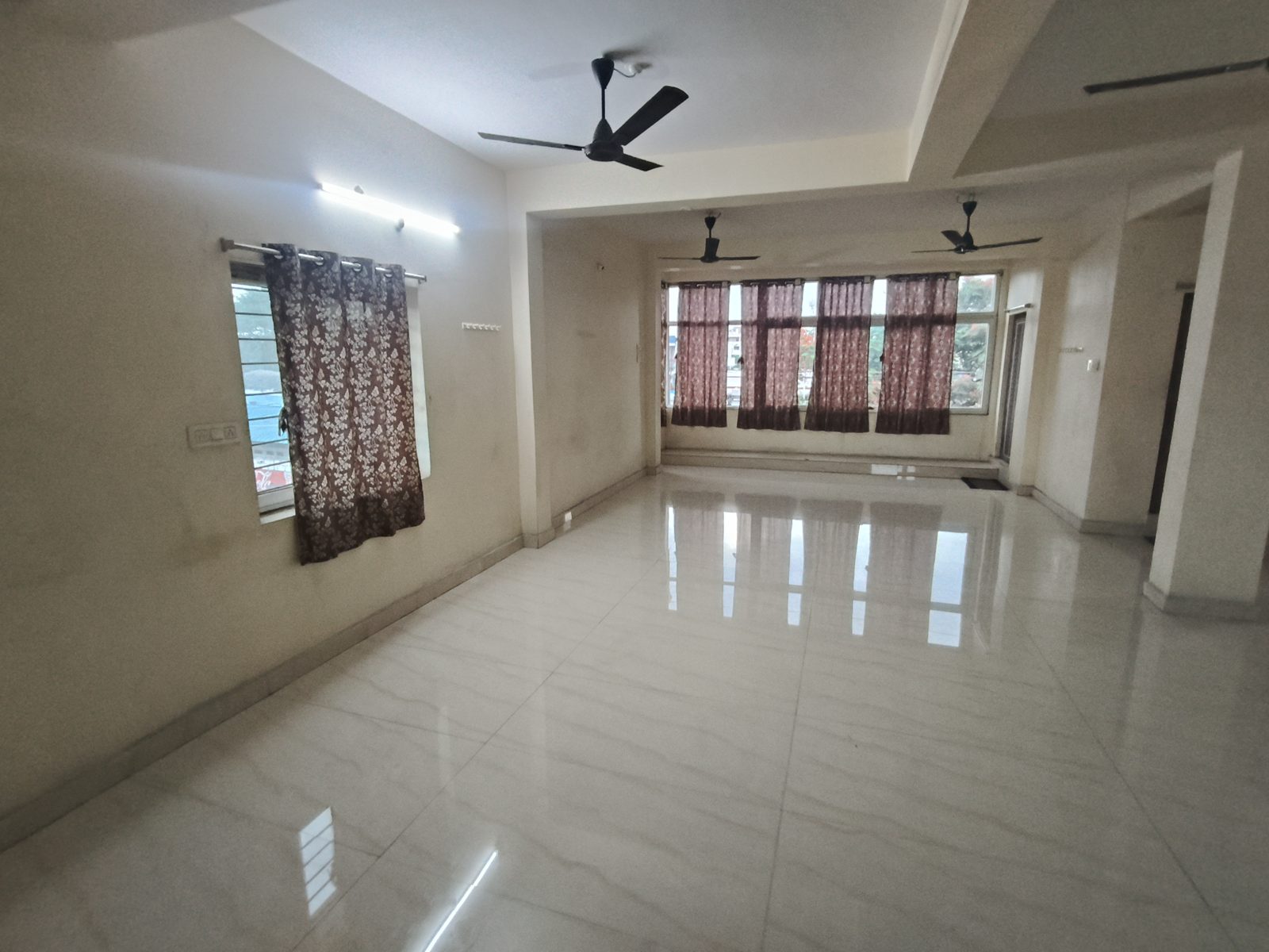 Decoration friendly hall with curtained windows and bright interiors