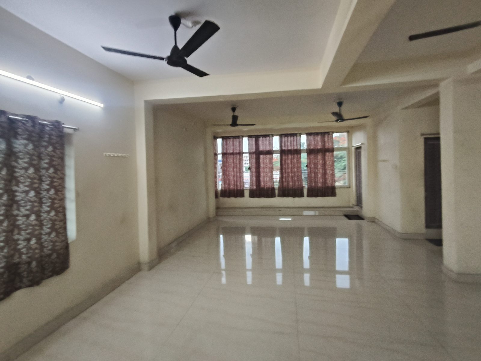 Wide banquet hall interior ready for a wedding reception