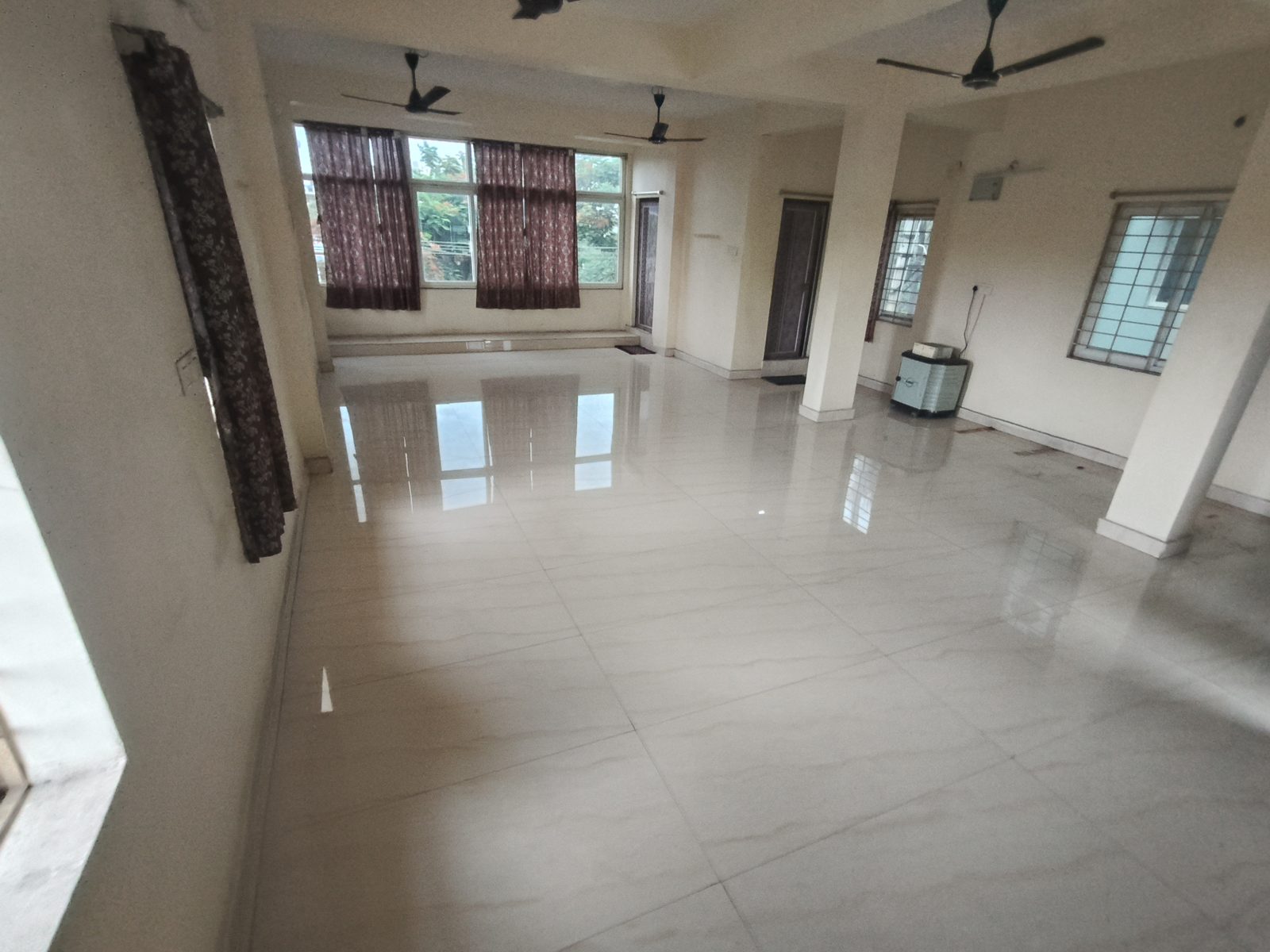 Guest seating and walkway inside Blessing Convention Hall